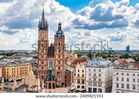 St. Mary's Basilica on the old town of Cracow, Poland. Aerial view. Royalty-Free Stock Photo #2409821593