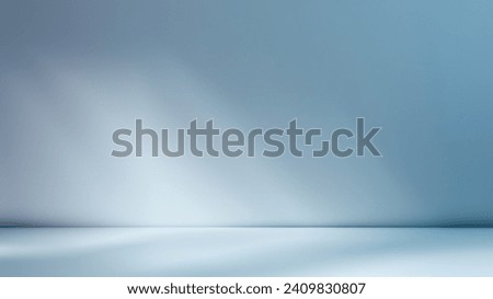 Minimalistic simple abstract light blue background for product presentation. Shadow and light from windows on wall. Royalty-Free Stock Photo #2409830807