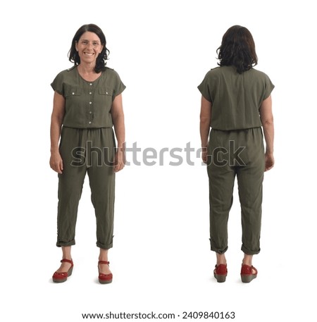 front and back view of a woman wearing a jumpsuit on white background Royalty-Free Stock Photo #2409840163