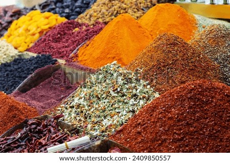 Multicolor spices sold at Egypt Bazaar (Misir Carsisi) in Istanbul, Turkey (Turkiye). Selected focus, copy space, Spices Market with colourful mood. Colorful background