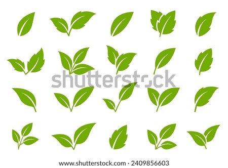 set of abstract isolated green leaves icons, environmental emblem and label, branches, twigs and sprigs silhouettes on white background Royalty-Free Stock Photo #2409856603
