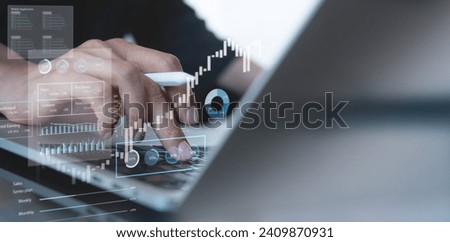 Businessman using laptop computer analyzing sales data and financial report, business growth graph chart. digital marketing planning and strategy, financial report, business, finance and investment