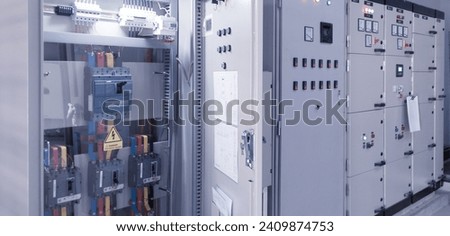 Main breaker on the distribution panel control,Electrical switch gear at Low Voltage power control center cabinet in coal power plant. Royalty-Free Stock Photo #2409874753