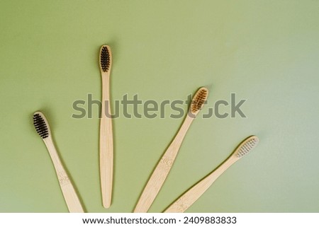 Eco tooth brushes on a beige background. Concept of dental examination of teeth, health and dental hygiene. Prevention of caries and tartar teeth.