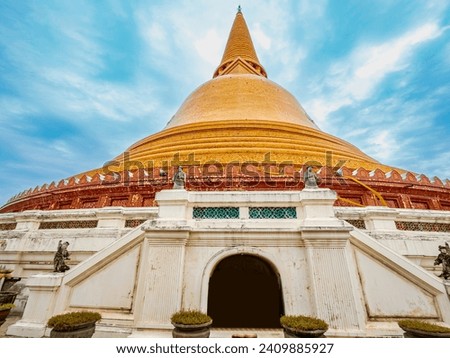 The Gigantic Pagoda, namely Pra Phathom Chedi, with the corridor on its base inside the Buddhist temple of Nakorn Pathom provice, Thailand