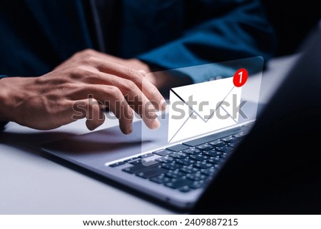 Email marketing concept, businessman use laptop with virtual email notification alert. Direct selling project in customer list business for email.
