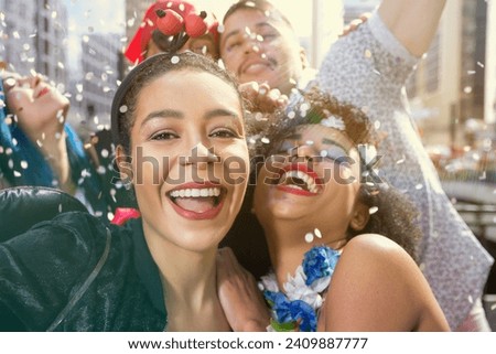 Carnaval party. Dressed group of Brazil people in the street Carnival. Dressed brazilian revelers celebrating in parade festival. Royalty-Free Stock Photo #2409887777