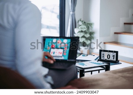 work Frome home. Businessman working Shopping online with laptop and documents on his desk, modern work concep.