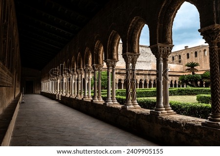 Cloister of the Benedictine Monastery of Monreale next to the cathedral in the old town of Monreale, Palermo, Sicily, Italy Royalty-Free Stock Photo #2409905155
