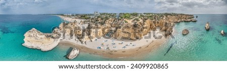 Panoramic drone picture over Praia do Prainha beach in Portuguese Algarve during daytime in summer
