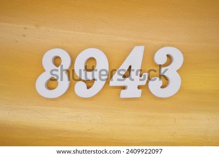 The golden yellow painted wood panel for the background, number 8943, is made from white painted wood.