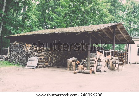 wooden log storage place for heating - vintage retro look