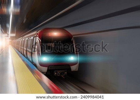 Suburban passenger electric train rushes at high speed past the platform at the railway station into the tunnel underground.