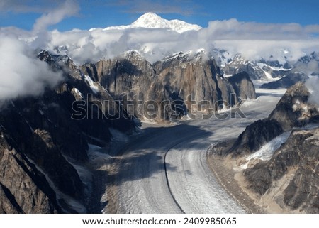 Alaska- Glacier in the Denali National Park photographed from an airplane in the background of Mount Denali, formerly Mount McKinley Royalty-Free Stock Photo #2409985065
