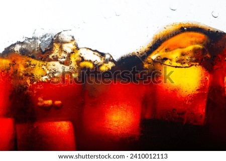 Close-up shot of cola and ice isolated on white background,macro cola texture,Side view background of refreshing cola flavored soda with air bubbles isolated on white