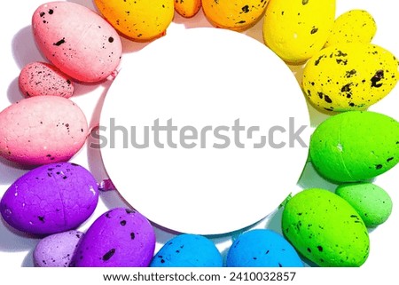 Easter eggs composition with round stand, isolated on white background. Traditional festive symbol, colorful design, hard light, dark shadow, top view, close up