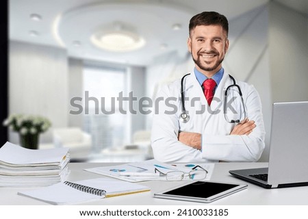 Doctor, healthcare worker at hospital working with laptop