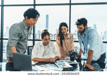 Skilled multicultural businesspeople discuss about business idea. Professional manager brainstorming, sharing, planing marketing strategy. Business team working together at modern office. Tracery. Royalty-Free Stock Photo #2410036429