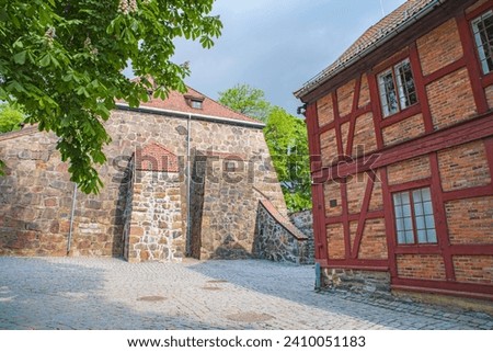 Akershus Fortress is a medieval castle and fortress located in Oslo. The fortress was built in the late 13th century to protect the city and was the residence of the Norwegian royal family
