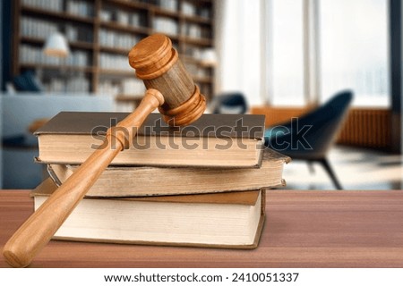 Legal services at Office. Wooden Hammer on desk