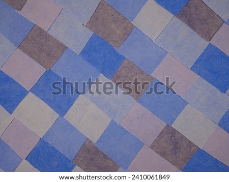 Handmade background in patchwork style with cotton fabric elements in blue tones   Royalty-Free Stock Photo #2410061849