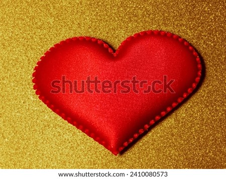 Red heart on gold background. Special design for Valentine's day, love concept.