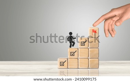Work in progress, Goals, targets. Wooden blocks with icon. Royalty-Free Stock Photo #2410099175