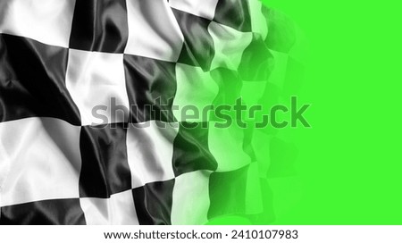 Checkered black and white racing flag on green background