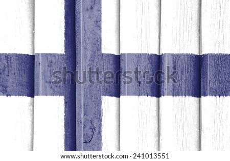 The concept of national flag on old ribbed wooden background: Finland