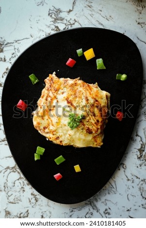 Lasagna is a wide, flat sheet of pasta, dish made with several layers of lasagna sheets with sauce and other in  ingredients. different plating and full dish, check out all the pictures.
