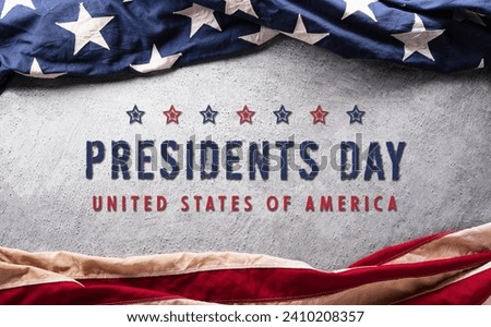 Happy Presidents day concept made from American flag and the text on dark stone background. Royalty-Free Stock Photo #2410208357