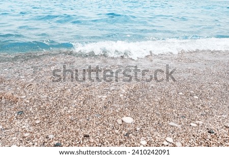 are you ready for summer? summer? clear blue sea, Magnificent aerial top view background photo of ocean sea water white wave splashing in deep sea. Drone photo background of sea wave in bird's eye wav