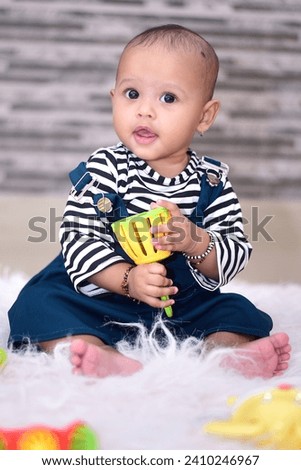 Cute baby girl Playing with toy