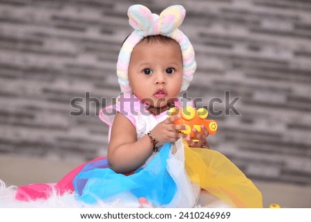 Cute baby girl Playing with toy