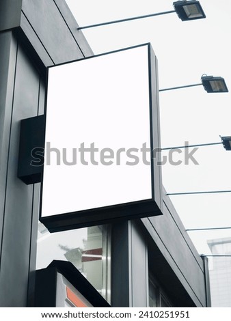 Mock up Signboard Black frame square shape Front Shop Sign Modern building