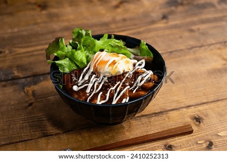 bowl of rice topped with pork and mayo