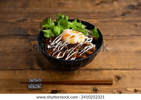 bowl of rice topped with pork and mayo