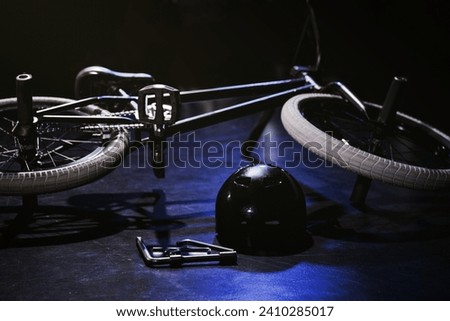 A image of bmx bicycle and helmet