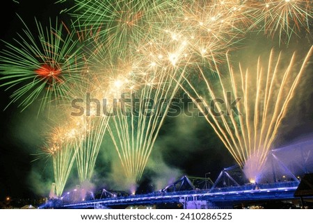 Picture of illumination and fireworks at Memorial Bridge in APEC 2022, Chao Phraya River, Phra Nakhon, Bangkok, Thailand