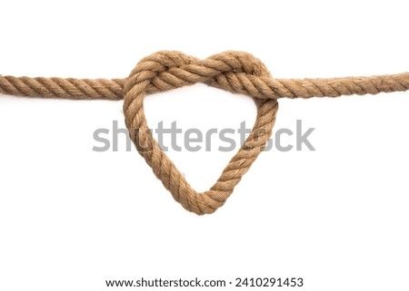 Thick rope on white background Royalty-Free Stock Photo #2410291453