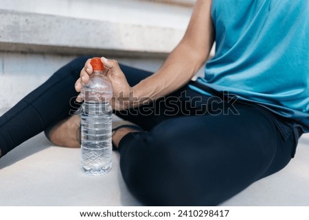 Close up picture of a sportsman resting after workout