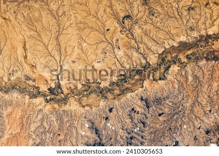 Shebelle River Floodplain. Southeastern Ethiopias longest river supports the growth of green vegetation amid the otherwise brown, desert. Elements of this image furnished by NASA.