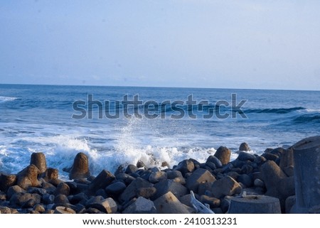 A group of tetrapod-shaped breakwaters to dispel large waves on the shores of Glagah Beach, Yogyakarta