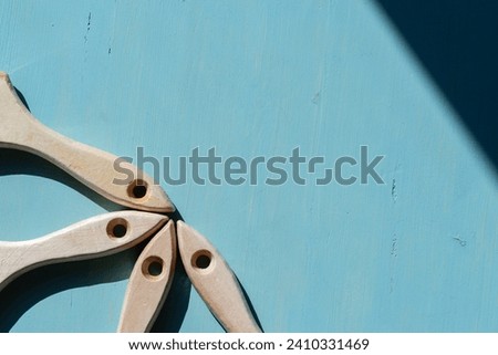 Multiple brushes lined up on a blue background