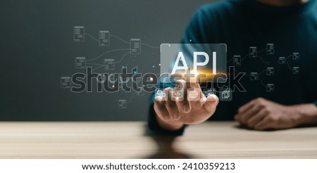 API Application Programming Interface concept, Man touch with virtual screen API icon Software development tool. Royalty-Free Stock Photo #2410359213