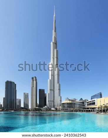 Dubai, UAE, January 12 2023: The Burj Khalifa in the center of Dubai is the tallest building in the world with 828 meters high. Royalty-Free Stock Photo #2410362543