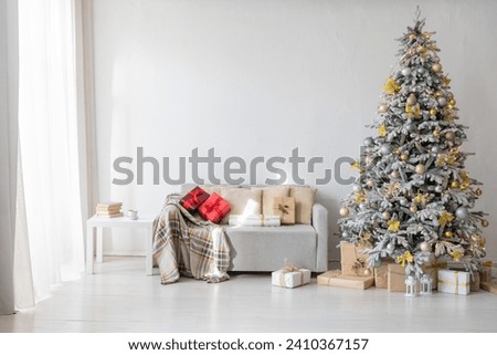 christmas tree with gifts in interior without people