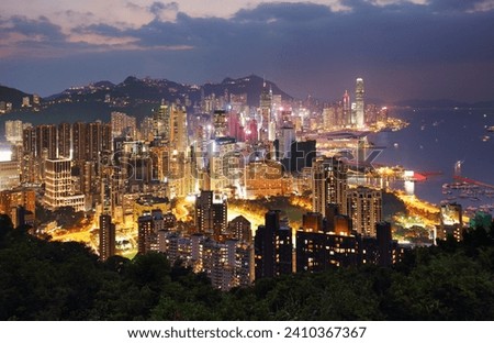 Hong Kong cityscape with skyscrapers at night