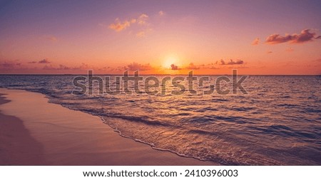 Sea sand sky concept, sunset colors clouds beachfront horizon. Inspire waves beams, meditation nature landscape, beautiful colors, wonderful scenery of tropical beach. Beachside travel summer vacation Royalty-Free Stock Photo #2410396003
