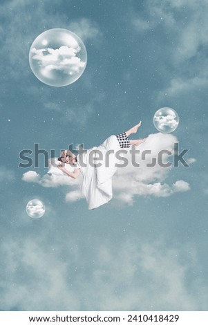 Vertical surrealistic photo collage of sleepy young woman woken up on cloud slumber relax morning nap rest on sky background Royalty-Free Stock Photo #2410418429